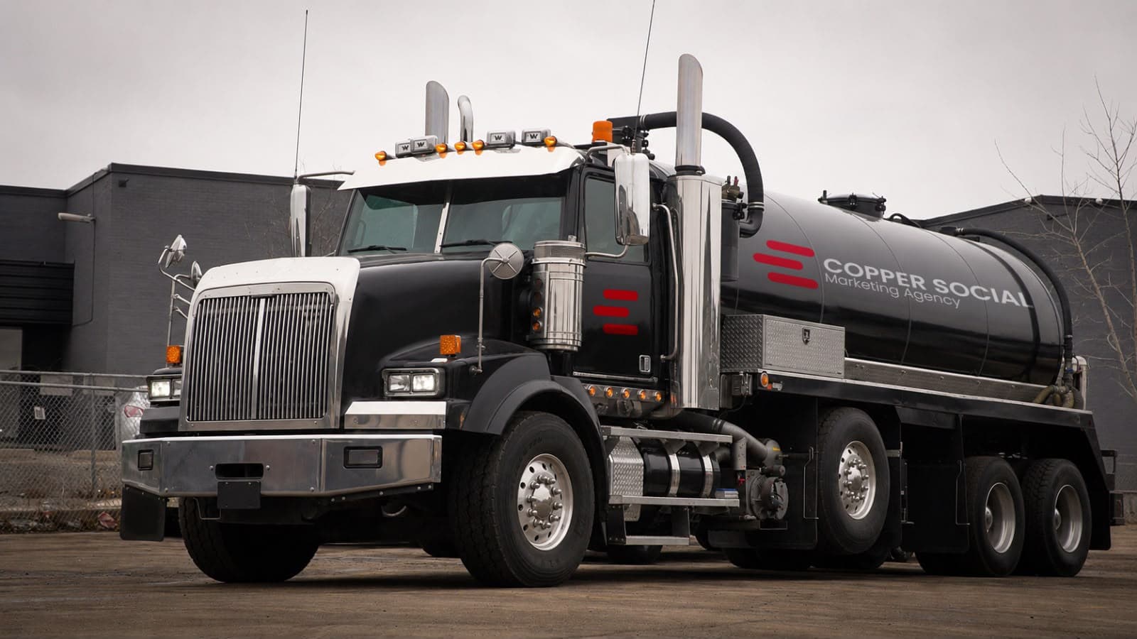 Branded JP Grease Trap Service vacuum truck, real-work photography that builds trust on a grease trap company website